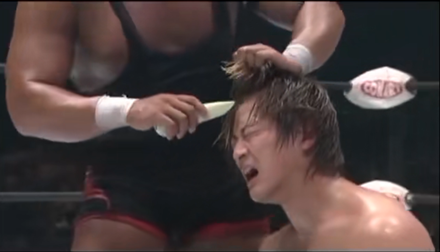 Shingo shaves Hulk's hair in the ring