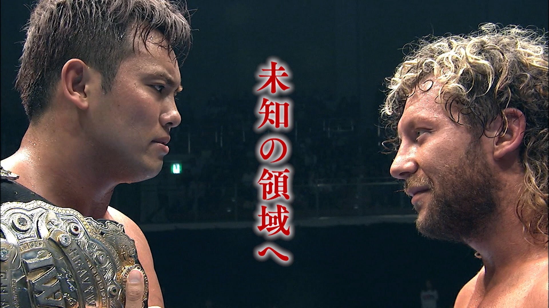 Match graphic of Kenny and Okada facing each other. 