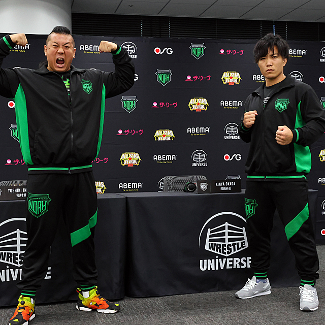 Okada and Inamura posing next to each other at a press conference