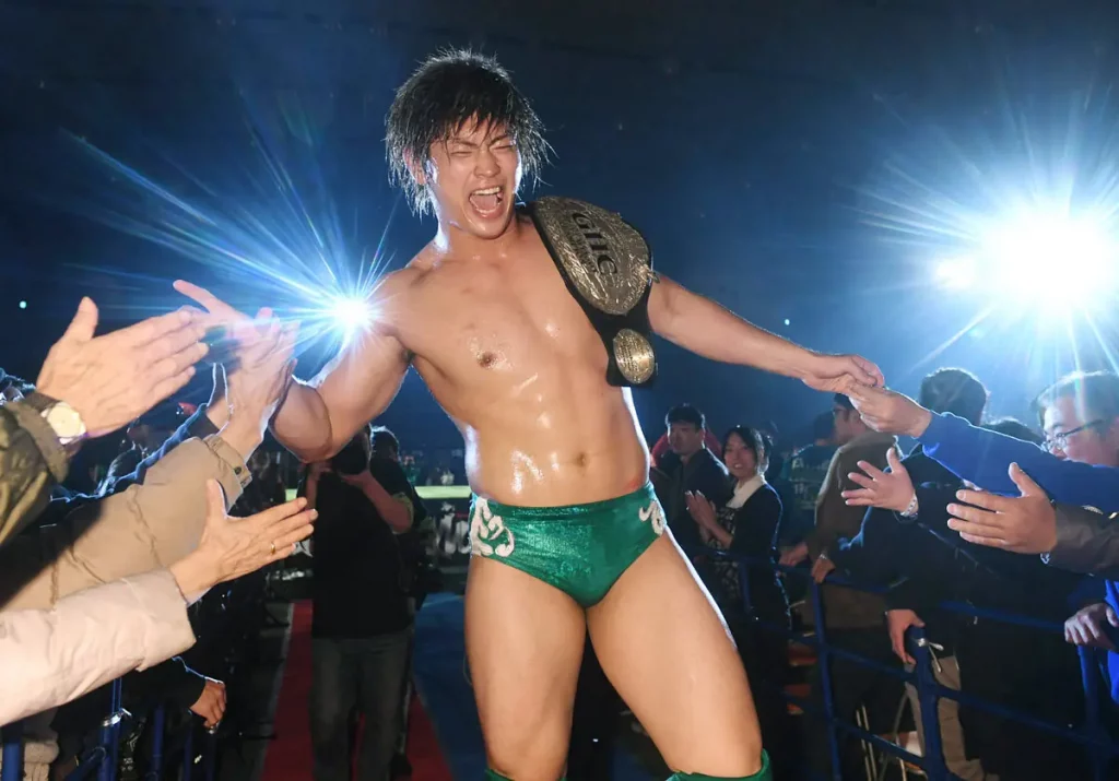 Kaito in green trunks