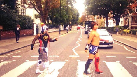 An image from Hiromu's excursion of Hiromu and Kenbai at Abbey Road, mimicking the famous Beatles album cover. 