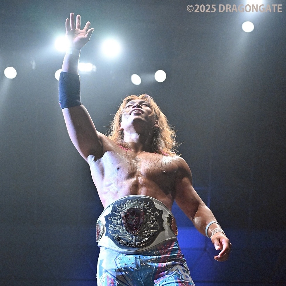 Ryoya Tanaka stands under the bright lights at Kobe World, wearing the Bravegate Championship for the first time. 